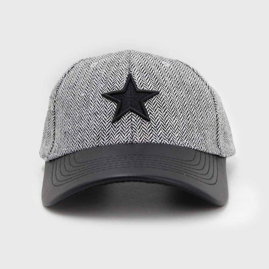 Gorra diseño espiga y estrella con visera de cuerina.